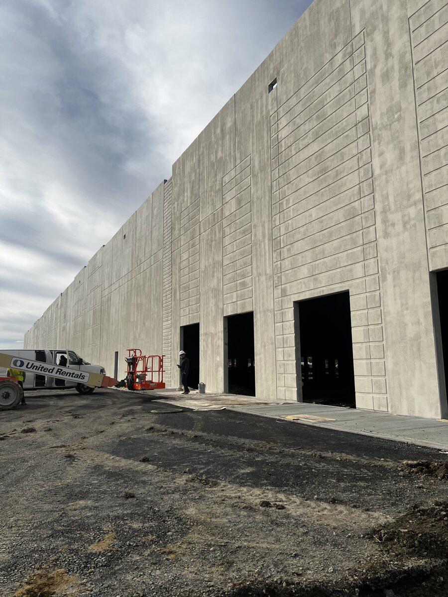 Newburgh Commerce Center construction phase showing concrete tilt-wall and loading docks